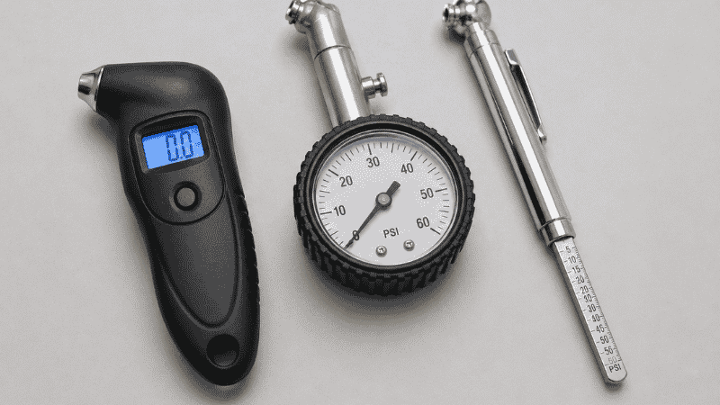 Three types of tire pressure gauges side by side: a digital gauge, a dial analog gauge, and a pencil stick gauge showing the different options available