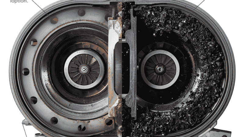 Side-by-side comparison of a clean intake valve versus a carbon-encrusted valve from a direct-injection turbo engine.