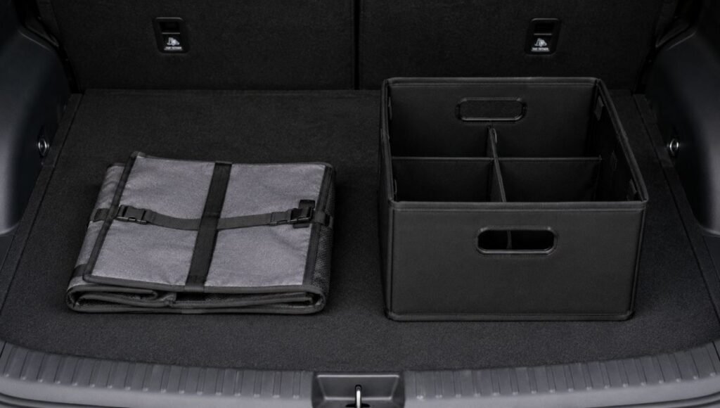 Side by side comparison of a collapsible fabric trunk organizer folded flat versus a rigid plastic trunk organizer box showing the storage and flexibility difference