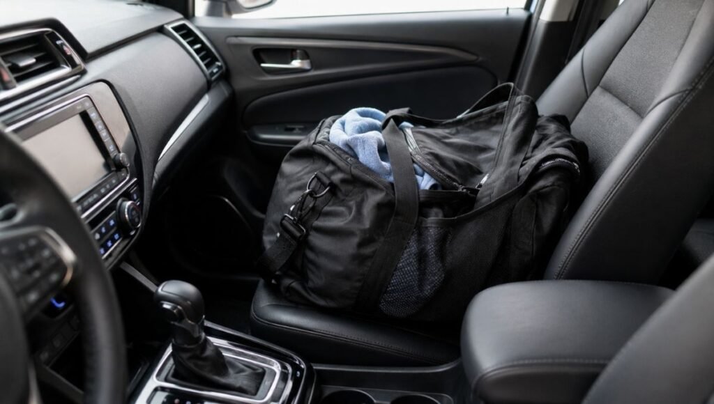 A heavy bag or groceries placed on the passenger seat of a car that can confuse the occupant weight sensor and trigger the airbag warning light